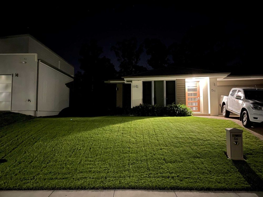 Wintergreen-Couch-Turf-Grass-Lawn-at-night-front-of-house-w - CT Lawns Turf